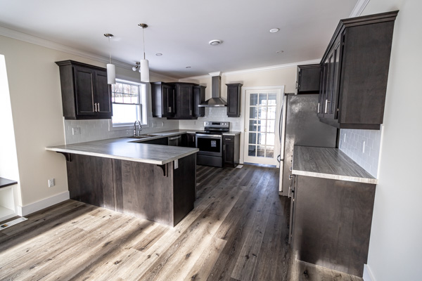 View of Kitchen with Peninsula and Stainless Steel Appliances